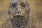 Moneta w ustach zmarłego, tzw. obol Charona
